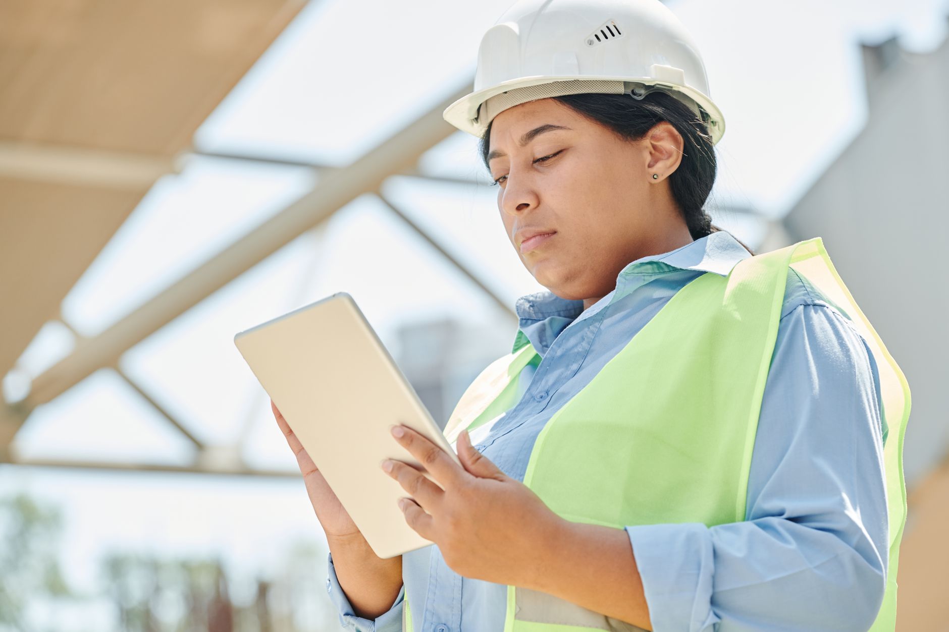 Project manager on site with a tablet